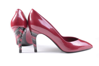 Red high heeled shoes with mixed colour heels