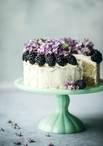Cake with blackberry and flower topping