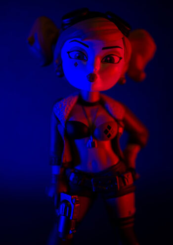 Female doll with blue background
