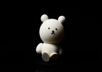 Small toy rabbit with black background