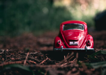 Rear view of red toy Beetle car