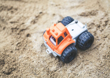Toy lorry in the sand
