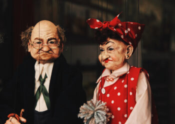Male and female string puppets