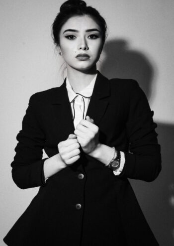 Female wearing suit black and white