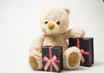 Teddy bear with boxed presents