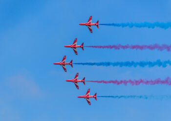 Red Arrows display team flying in V formation
