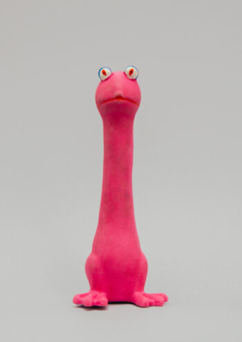 Pink animal toy with grey background