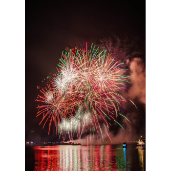 Colourful fireworks over water