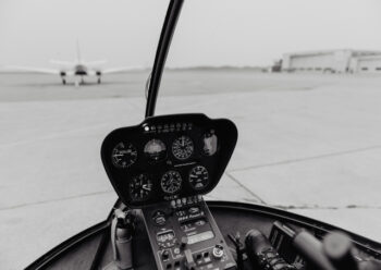 Inside helicopter cockpit black and white